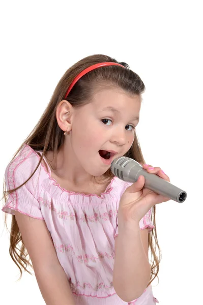 Menina cantando em um fundo branco — Fotografia de Stock
