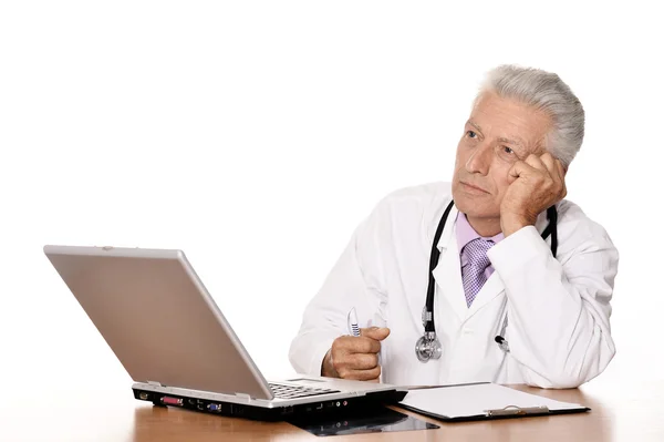 Thoughtful senior doctor — Stock Photo, Image