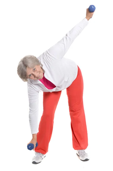 Mujer mayor haciendo ejercicio — Foto de Stock