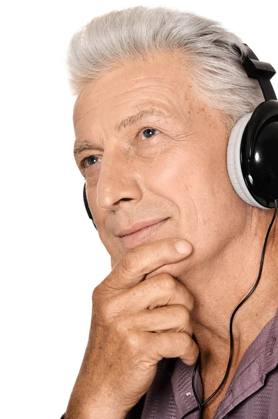 Hombre mayor en auriculares — Foto de Stock
