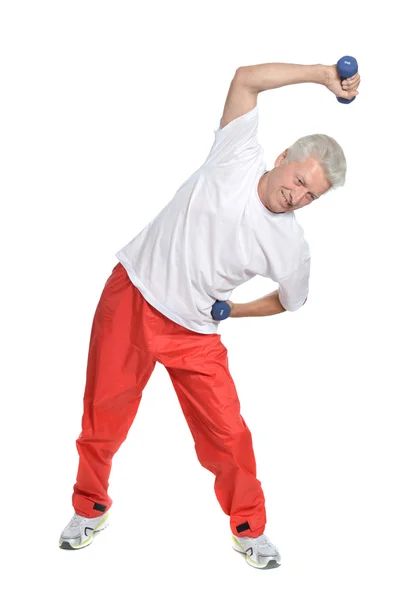 Hombre mayor en el gimnasio — Foto de Stock