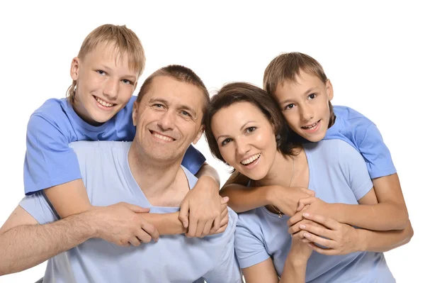 Vrolijke familie van vier — Stockfoto