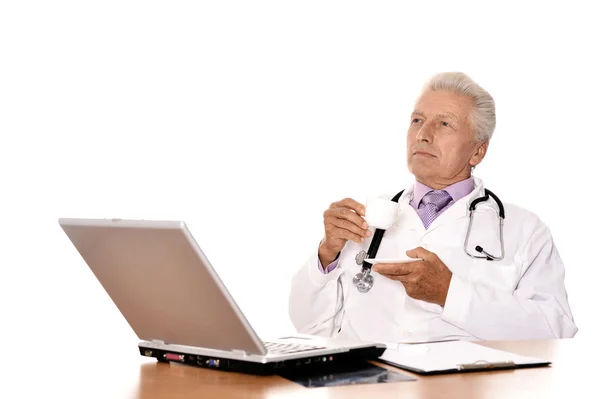 Senior doctor with computer — Stock Photo, Image