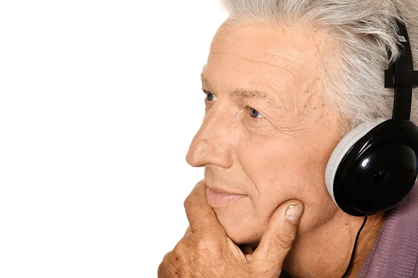 Hombre mayor en auriculares — Foto de Stock