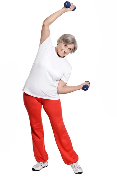 Mujer mayor haciendo ejercicio — Foto de Stock