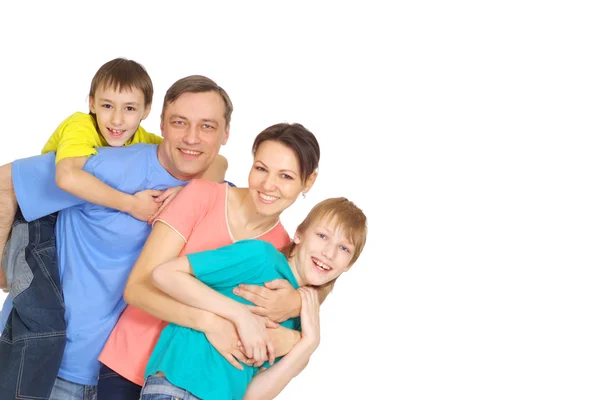 Família interessante em camisetas brilhantes — Fotografia de Stock