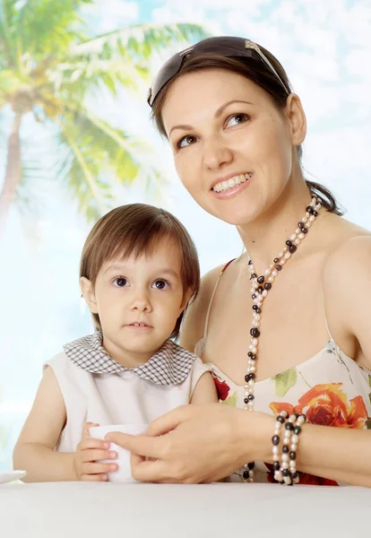 Nice woman with daughter at the resort — Stock Photo, Image