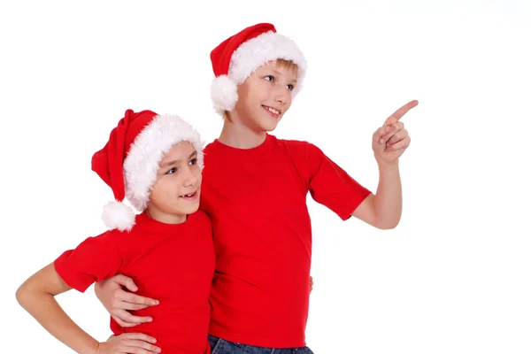 산타 모자에 작은 형제 — 스톡 사진