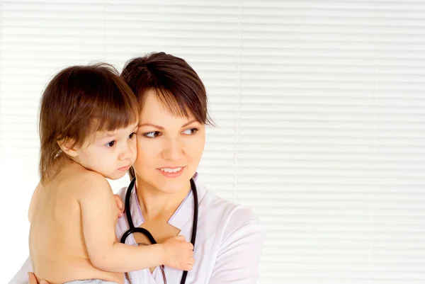 Interesting physician with small patient — Stock Photo, Image