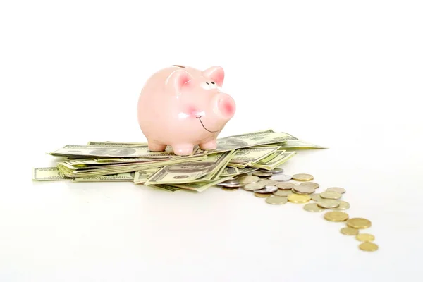 Superb piggy bank and a pile of coins — Stock Photo, Image