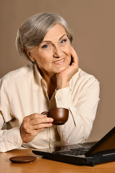 Elderly woman at home — Stock Photo, Image