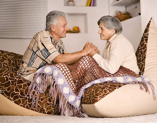 Happy beautiful elderly couple relaxing at home — Stock Photo, Image