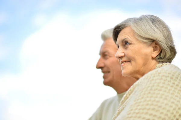 Elderly couple against sky Stock Photo