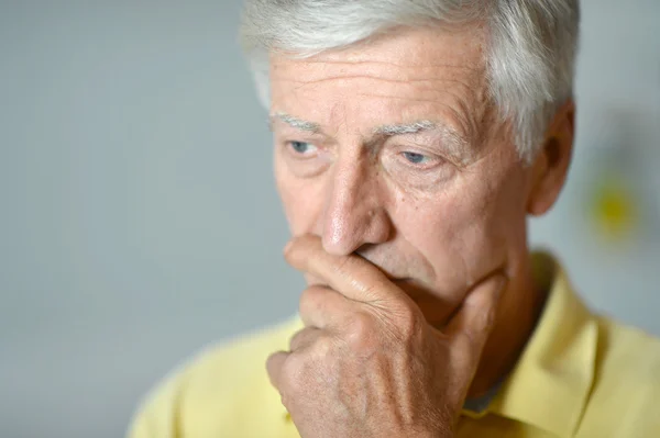 Thoughtful elderly man — Stock Photo, Image