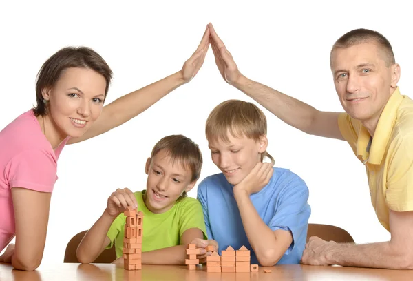 Família brincando em casa — Fotografia de Stock