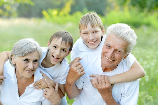Family at in park — Stock Photo, Image
