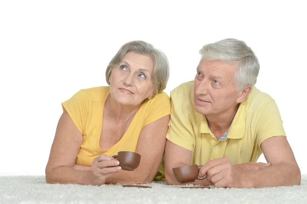 Familie auf Teppich — Stockfoto