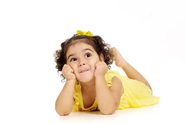 Girl in a yellow dress — Stock Photo, Image