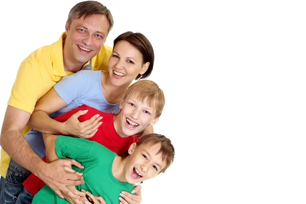 Adorable family in bright T-shirts — Stock Photo, Image