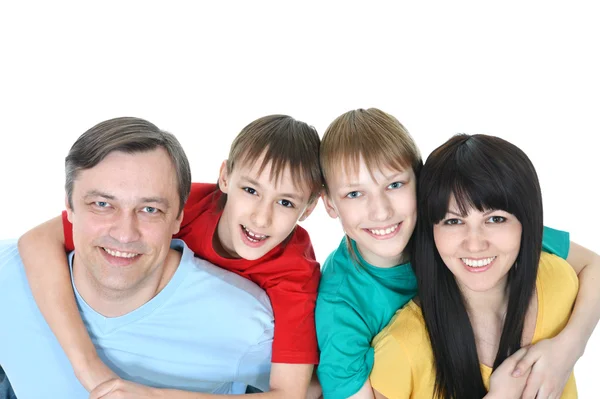 Aile içinde renkli tişörtler — Stok fotoğraf