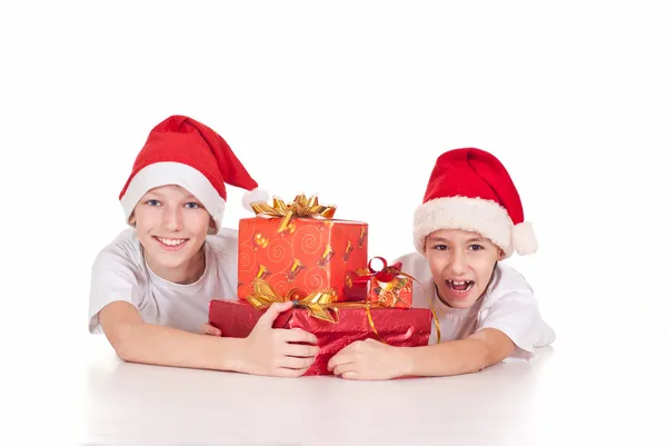 Barn med julklappar — Stockfoto