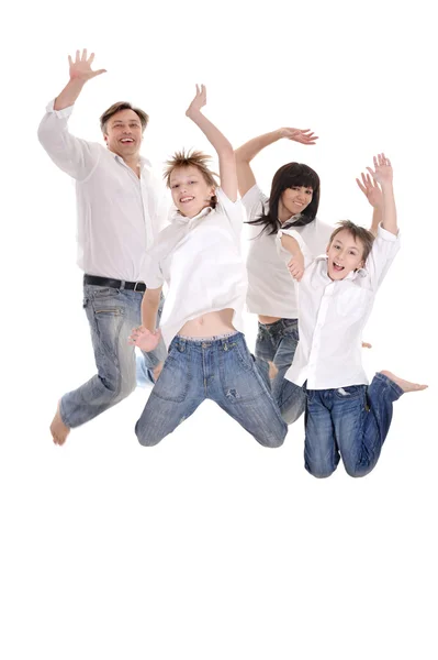 Alegre familia saltando —  Fotos de Stock