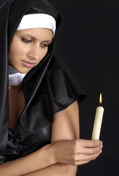 Fine girl dressed as a nun — Stock Photo, Image