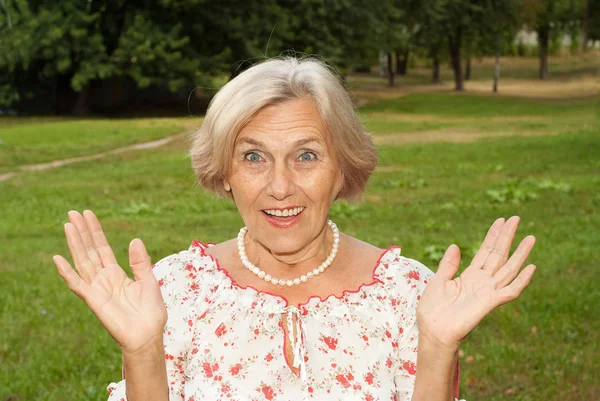 Attractive elderly woman — Stock Photo, Image