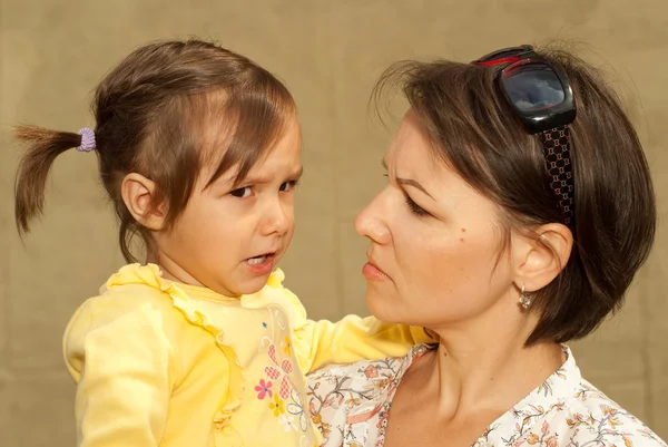 Cute mother and daughter on the street — Stock Photo, Image