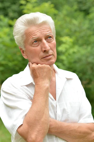 Pensive elderly man — Stock Photo, Image