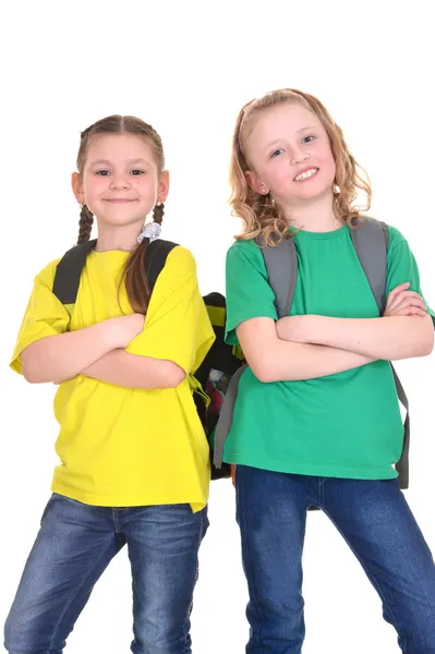 Twee vrolijke schoolmeisjes — Stockfoto