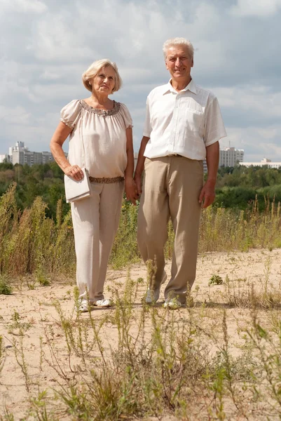 Positive elderly couple went for a walk — Stock Photo, Image