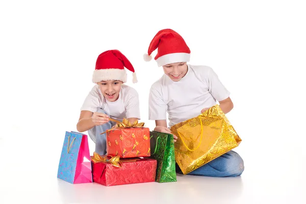 Santa kids with presents — Stock Photo, Image