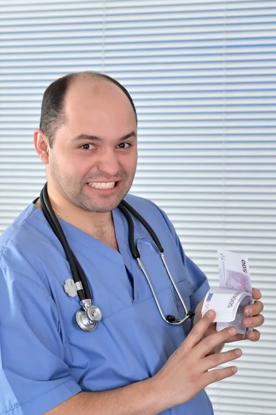 Ritratto di un medico in uniforme blu — Foto Stock