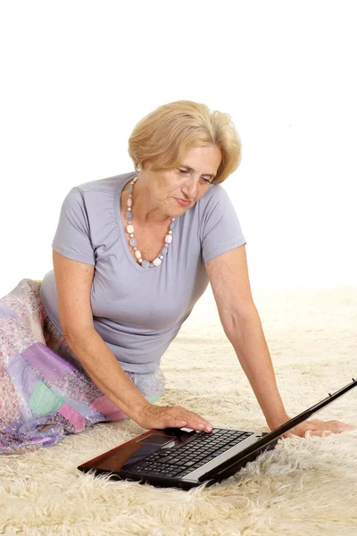 Aged woman relaxing at home — Stock Photo, Image