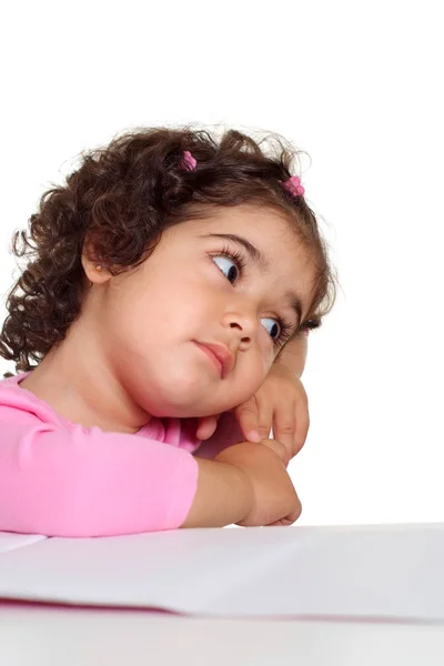 Pensive small girl draws — Stock Photo, Image