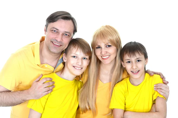 Glückliche Familie in gelben T-Shirts — Stockfoto