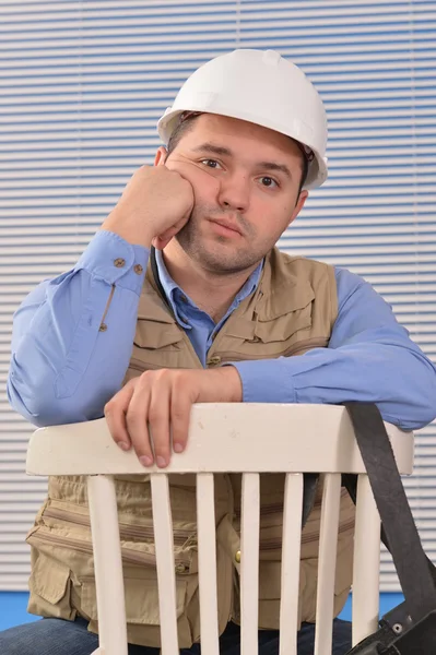 Confident handyman in studio — Stock Photo, Image