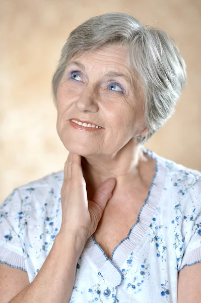 Elderly woman in the studio — Stock Photo, Image