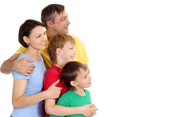 Thinking family in bright T-shirts — Stock Photo, Image