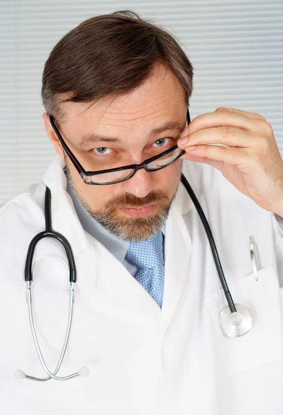 Clever doc in his office — Stock Photo, Image