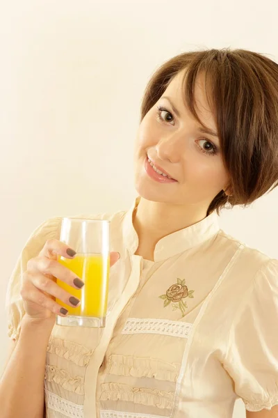 Young woman with juice — Stock Photo, Image