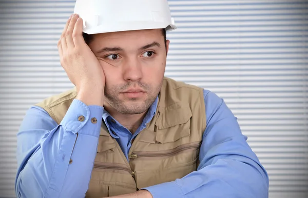 Confident handyman in studio — Stock Photo, Image