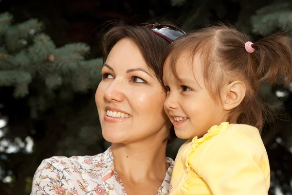 Amusing mother and daughter in the forest — Stock Photo, Image