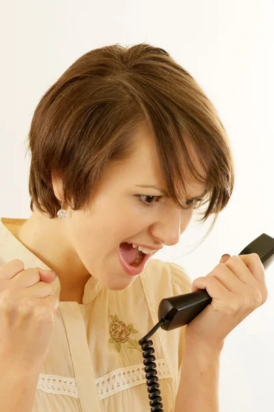 Rozzlobený mladá žena s telefonem — Stock fotografie