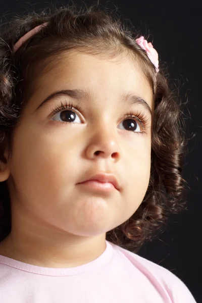 Girl on a black background — Stock Photo, Image