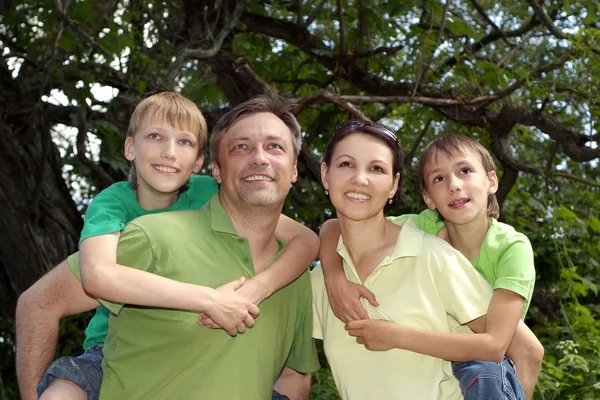 Family in the green jersey — Stock Photo, Image