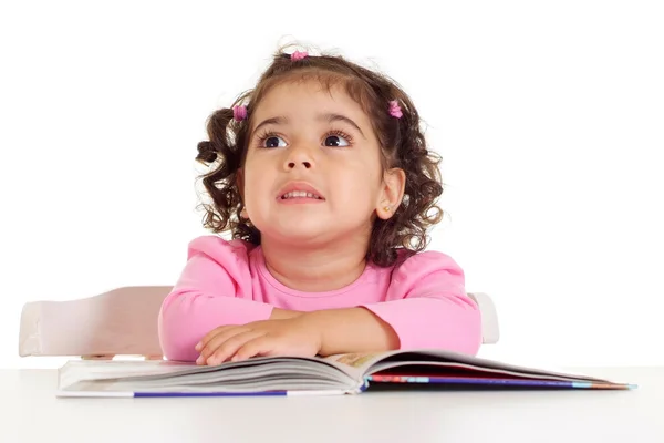 Wonder little girl with book Stock Image