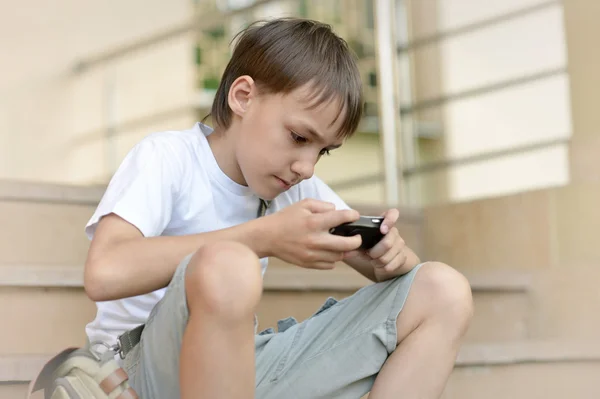 young guy playing