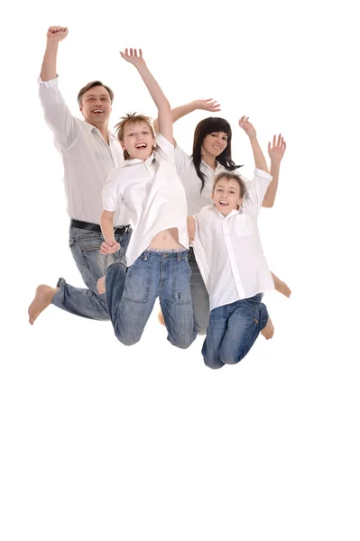 Cheerful family jumping — Stock Photo, Image